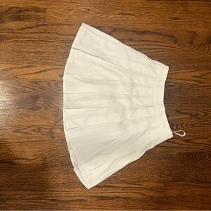 White pleated skirt. Never worn.